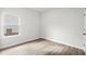 Bedroom featuring hardwood floors and a window at 642 Cottage Landing Dr, Summerville, SC 29485