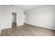 Empty bedroom with hardwood floors and view into closet space at 642 Cottage Landing Dr, Summerville, SC 29485