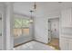 Bright breakfast nook with a window view and modern light fixture at 704 N Godfrey Park Pl, Charleston, SC 29407
