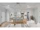 Modern kitchen with white cabinetry, stainless steel appliances, and a breakfast bar at 704 N Godfrey Park Pl, Charleston, SC 29407