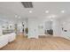 Open-concept layout showcasing the kitchen, living area, and modern design at 704 N Godfrey Park Pl, Charleston, SC 29407