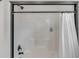 Shower featuring updated fixtures and white shower curtain at 704 N Godfrey Park Pl, Charleston, SC 29407