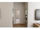 Hallway view showcasing the entry to the bathroom and main bedroom at 7631 Indigo Palms Way, Johns Island, SC 29455