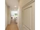 Hallway view showcasing the open floor plan, dining area, kitchen, and natural light at 7631 Indigo Palms Way, Johns Island, SC 29455