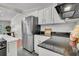 Updated kitchen featuring stainless steel appliances, white cabinets, and ample counter space at 817 Savage Rd, Charleston, SC 29407