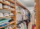 Spacious walk-in closet with built-in shelving and ample storage for clothes and accessories at 817 Savage Rd, Charleston, SC 29407