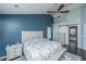 Spacious main bedroom featuring a decorative rug, and an ensuite bathroom at 8512 Kennestone Ln, Charleston, SC 29420