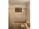 Outdated bathroom needs renovation, including tub, toilet, and sink, in this fixer-upper property at 90 Romney St, Charleston, SC 29403
