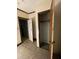 Hallway with multiple doorways and a closet space, perfect for storage solutions and easy access at 90 Romney St, Charleston, SC 29403