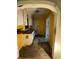 Compact kitchen with vintage cabinets and floors, ready for a modern renovation at 90 Romney St, Charleston, SC 29403