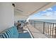 Spacious balcony with outdoor seating area, perfect for relaxing with ocean views and enjoying the coastal breeze at 9002 Palmetto Drive #514 1/13 Share, Isle of Palms, SC 29451
