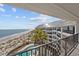 View of the building, pool and beach from the balcony at 9002 Palmetto Drive #514 1/13 Share, Isle of Palms, SC 29451