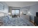 Bedroom with balcony access, white furniture and light blue walls at 9002 Palmetto Drive #514 1/13 Share, Isle of Palms, SC 29451