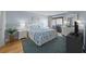 Comfortable bedroom with matching furniture and sliding door to the balcony at 9002 Palmetto Drive #514 1/13 Share, Isle of Palms, SC 29451