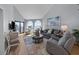 Cozy living room showcasing comfortable seating, stylish decor, ocean views, and an open floor plan at 9002 Palmetto Drive #514 1/13 Share, Isle of Palms, SC 29451