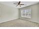 Comfortable bedroom features ceiling fan, and window, creating a serene and relaxing atmosphere at 9620 Pebble Creek Blvd, Summerville, SC 29485