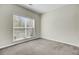 Cozy bedroom with large window and neutral carpet at 9620 Pebble Creek Blvd, Summerville, SC 29485