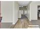 Inviting entryway features a mix of hardwood and carpet flooring at 9620 Pebble Creek Blvd, Summerville, SC 29485
