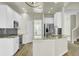 Kitchen boasts granite countertops and new stainless steel appliances at 9620 Pebble Creek Blvd, Summerville, SC 29485
