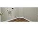 A utilitarian laundry room features durable flooring and practical utility connections at 9620 Pebble Creek Blvd, Summerville, SC 29485