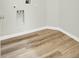 A functional laundry room featuring durable flooring and practical utility connections at 9620 Pebble Creek Blvd, Summerville, SC 29485
