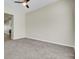 Living room with gray carpet and view of the kitchen appliances at 9620 Pebble Creek Blvd, Summerville, SC 29485