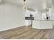 Open floor plan living space with kitchen and dining area, ideal for entertaining at 9620 Pebble Creek Blvd, Summerville, SC 29485