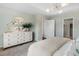 Inviting bedroom with elegant decor, natural light, and a decorative dresser at 103 Pen Shell St, Summerville, SC 29485