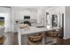 Modern kitchen boasts stainless appliances, ample cabinets, a sleek counter, and a breakfast bar at 103 Pen Shell St, Summerville, SC 29485