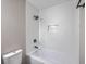 Bright bathroom showcasing a tiled shower-tub combo and modern fixtures at 104 Ashdown Dr, Summerville, SC 29483
