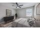 A cozy bedroom featuring a ceiling fan, neutral colors, and tasteful decor at 104 Ashdown Dr, Summerville, SC 29483
