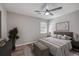 Comfortable bedroom with a ceiling fan, a bed with white linens, and natural light at 104 Ashdown Dr, Summerville, SC 29483