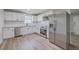 A well-lit kitchen with stainless steel appliances and light wood flooring at 104 Ashdown Dr, Summerville, SC 29483