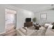 Well-lit living room with stylish decor and a contemporary sofa arrangement at 104 Ashdown Dr, Summerville, SC 29483