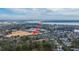Community aerial view shows a townhome's location near school, bridge and park at 1225 Blakeway St # 406, Charleston, SC 29492