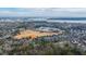 Scenic aerial view showing community's location near school, bridge, and waterways at 1225 Blakeway St # 406, Charleston, SC 29492