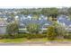 Aerial view of the neighborhood homes with lush landscaping and mature trees at 1225 Blakeway St # 406, Charleston, SC 29492