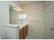 Bright bathroom featuring vanity with storage, a large mirror, and modern lighting at 1225 Blakeway St # 406, Charleston, SC 29492