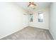 Bedroom with ceiling fan, carpet and windows with natural light, plus closet at 1225 Blakeway St # 406, Charleston, SC 29492