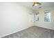 Bedroom with ceiling fan, carpet and windows with natural light, plus closet at 1225 Blakeway St # 406, Charleston, SC 29492