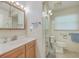 Bathroom featuring single sink vanity and toilet with grab bars at 1228 Hawthorne Rd, Hanahan, SC 29410