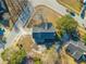 Aerial perspective of a traditional home, showcasing the roof, yard, and surrounding neighborhood at 1401 Cooper River Blvd, Moncks Corner, SC 29461