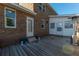 Inviting brick home featuring a spacious wooden back deck, perfect for outdoor gatherings at 1401 Cooper River Blvd, Moncks Corner, SC 29461