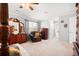 Comfortable bedroom featuring a bed, a leather chair, and dresser furniture at 1401 Cooper River Blvd, Moncks Corner, SC 29461