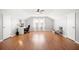 Bonus room featuring hardwood floors, ample space, and natural light creating a versatile and inviting atmosphere at 1401 Cooper River Blvd, Moncks Corner, SC 29461