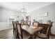 Inviting dining area with a large table and stylish chairs, perfect for Gathering meals and gatherings at 1401 Cooper River Blvd, Moncks Corner, SC 29461