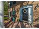Inviting front entrance with a black door, decorative wreath, and charming welcome sign at 1401 Cooper River Blvd, Moncks Corner, SC 29461
