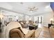 Open-concept living room and kitchen area with comfortable seating and bright lighting throughout at 1401 Cooper River Blvd, Moncks Corner, SC 29461