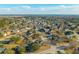 Scenic aerial view of a residential community featuring a mix of homes, trees, and neighborhood streets at 1401 Cooper River Blvd, Moncks Corner, SC 29461