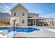 Beautiful backyard with a sparkling pool, a screened porch, and outdoor lounge furniture at 146 Stagecoach Ave, Summerville, SC 29486